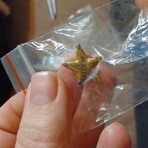 Vintage star with stones says I believe